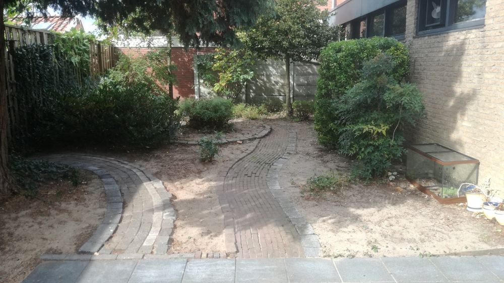 Tuinrenovatie: verwilderde tuin in Enschede na de opknapbeurt